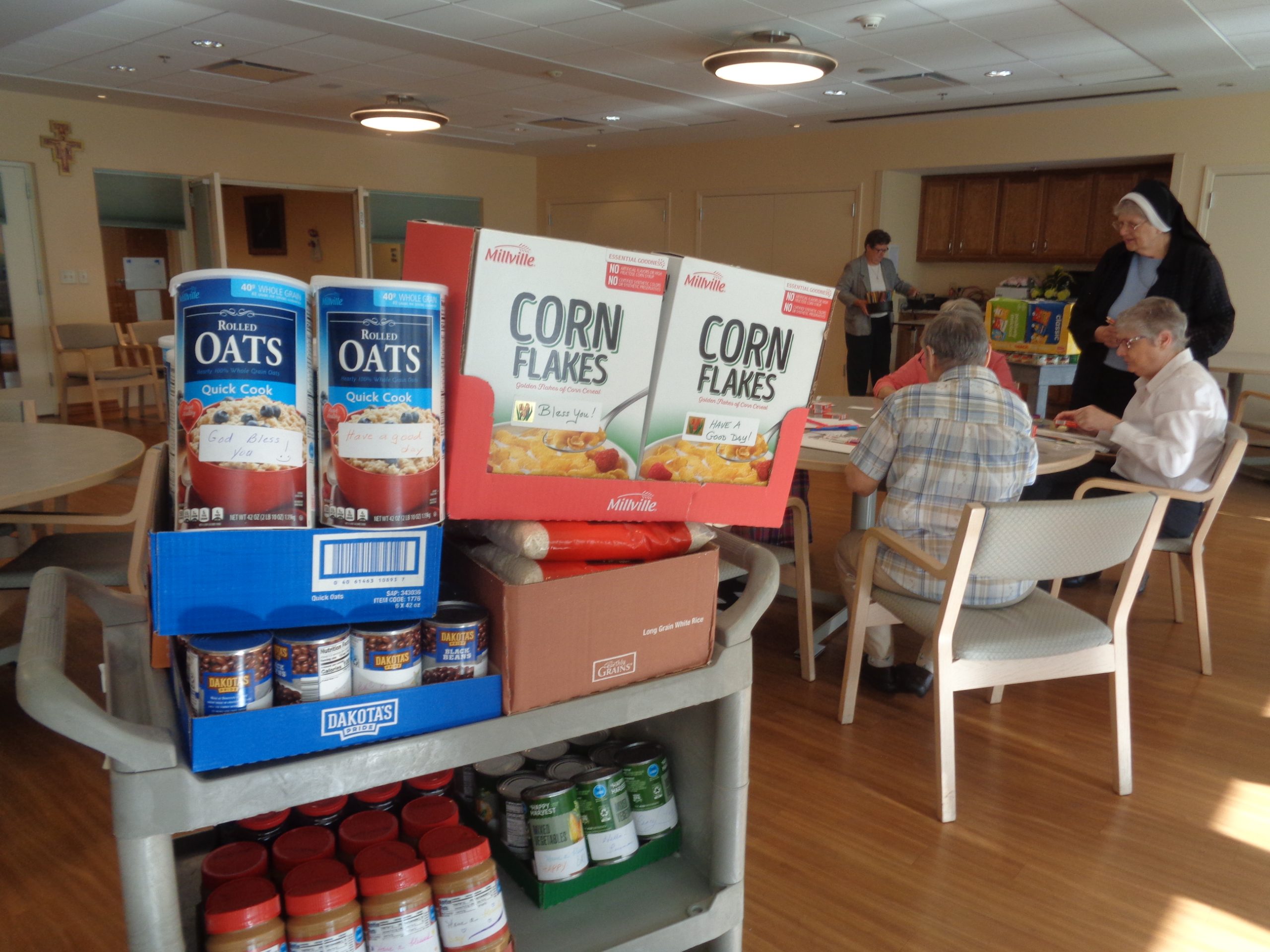 Cans of Justice food for St. Columba parish 2026
